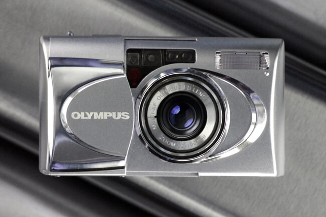 Купить пленочный Olympus Mju-V - это мечта.